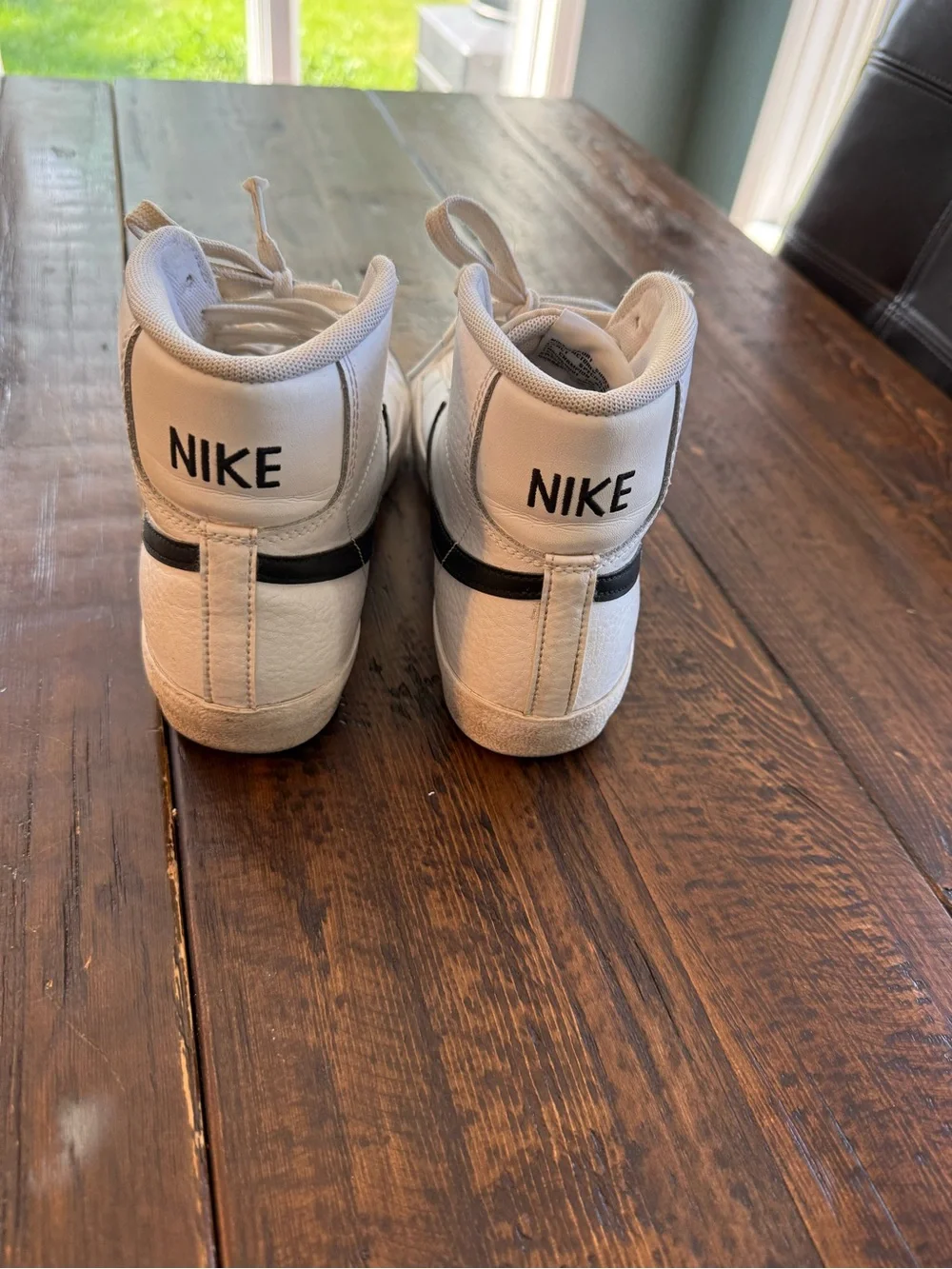 Nike Blazer White High-Top Sneakers with Black Swoosh and Cream Accents
